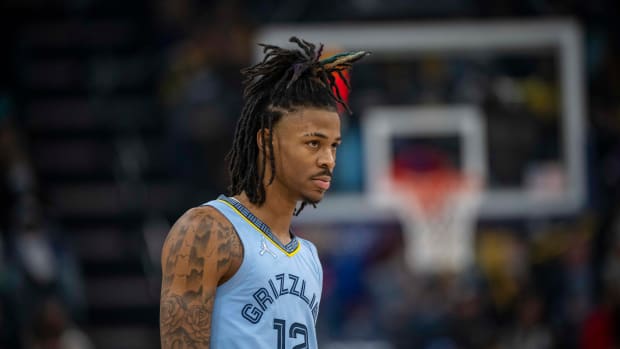 Ja Morant looks on during a game.